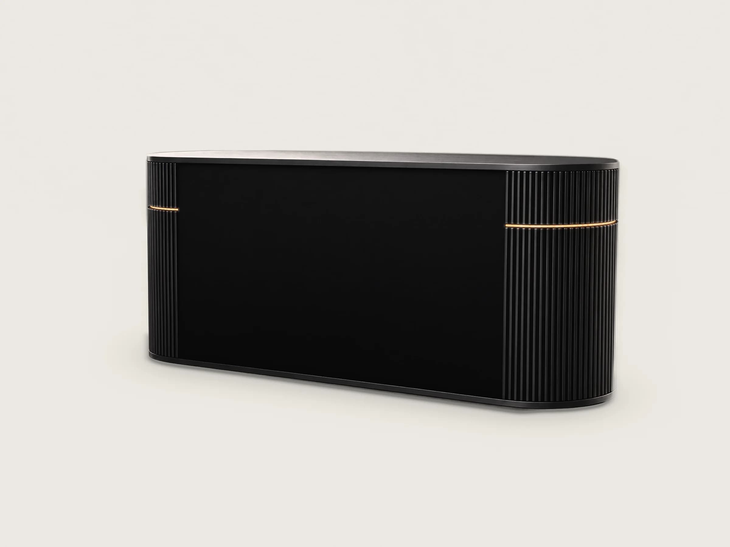 The back of Wick Ultra in graphite: a plain service panel between the fluted rounded ends