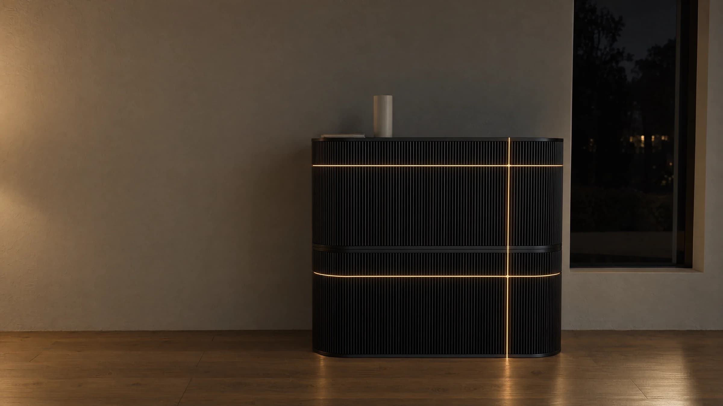 Two Wick Ultra units stacked flush against a wall at night. The vertical light runs unbroken through the join and both horizontal arms wrap the rounded ends